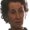 Ann Queensberry as Mrs. Schou
