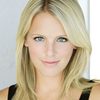 Liz Elkins Newcomer as Wendy Tempelton / Newspaper Woman