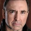 Michael J. Gwynn as Police Officer Holmes