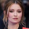 Emily Browning as Young Caitlin Greene