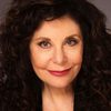 Karen Kondazian as Judge Arnett
