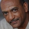 Tony Vaughn as Mr. Lewis