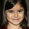Victoria Luna as Cristina (six years old)