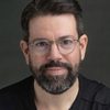 Jim Conroy as Race Announcer / Additional Voices (voice)
