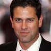 Patrick Baladi as John Hogan