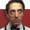 Claude Melki as Leon (segment "Rue Saint-Denis")