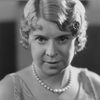 Daphne Pollard as Millie - the Maid