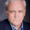 Brian Matney as Minister Thomas