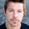 Nick McCallum as Burke