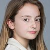 Natalie Olivia Clarke as Millie