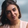Nazriya Nazim as Leela Thomas