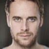 Ben Lambert as Nikolai