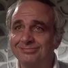 John P. Rousakis as Ocean Plaza Motel Manager