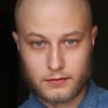 Sasha Golberg as Photographer