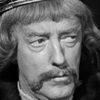 Tony Quinn as Andrew Rourke, Station Master (segment 'A Minute's Wait')