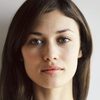 Olga Kurylenko as Kate