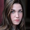 Katie Adkins as The Shopgirl