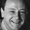 Robert King as Agent in Boston
