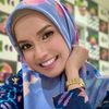 Faezah Elai as Lady X