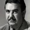 Billy Gilbert as Sultan / Auctioneer