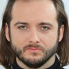 Michał Żurawski as Bortnik