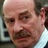 Denis Lill as James