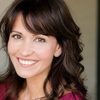 Jana Mitsoula as Reporter