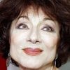 Judith Magre as Mme. Brezol