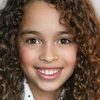 Mya-Lecia Naylor as Moore's daughter