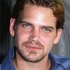 Scott Bairstow as Miles Tuck