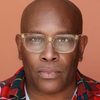 James Moses Black as Coach Oz