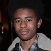 Marcus Carl Franklin as Woody / Chaplin Boy