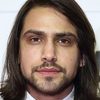 Luke Pasqualino as Greg