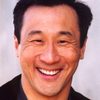 James Kiriyama-Lem as Driving Instructor
