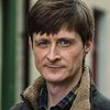 Aled Pugh as Tim
