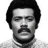 Thalmus Rasulala as Police Officer