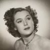 Kaye Dowd as Secretary(uncredited)