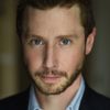 Michael Izquierdo as Trader
