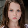 Caoilinn Springall as Young girl