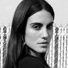 Luisa Moraes as Woman in Dress