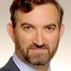 Adrian Dearnell as Newscaster