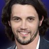 Nathan Parsons as Eric