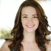 Madeline Ruskin as Maddie, Brad's Girlfriend