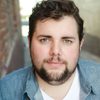 Joshua Hoover as Colonial Town Ticket Seller