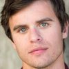 Garrett Coffey as Adam
