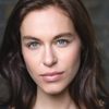 Kirsty Averton as Mia
