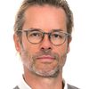 Guy Pearce as Bruce Cogburn