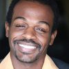 Dennis Thomas IV as Baxter Security Guard
