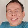 Warwick Davis as Wald / Pod race spectator / Mos Espa Citizen