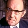 Redmond Phillips as Police doctor